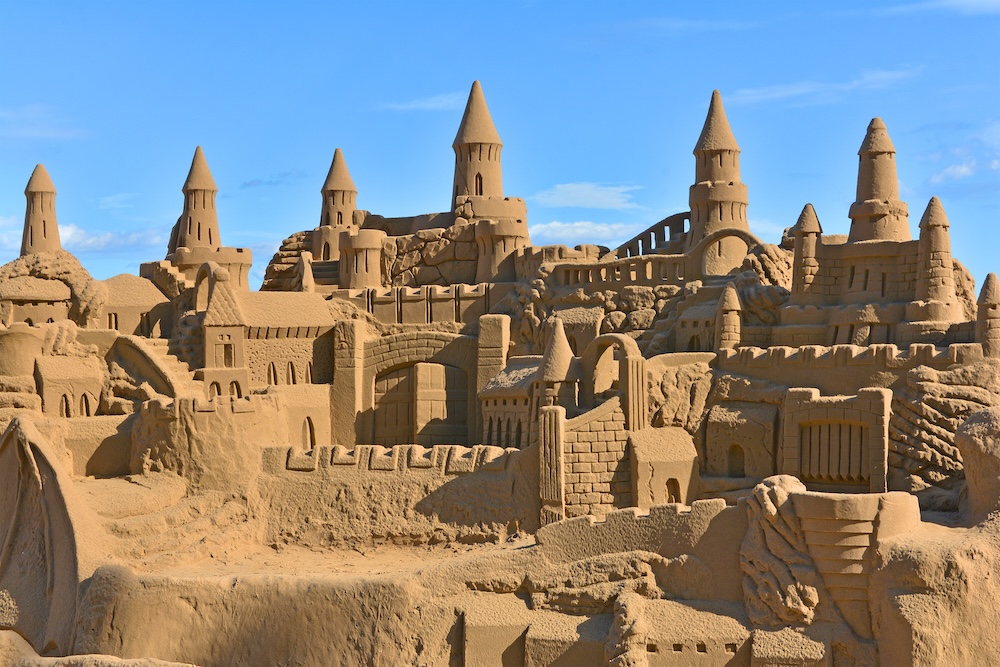 Beautiful large sandcastle on the beach 